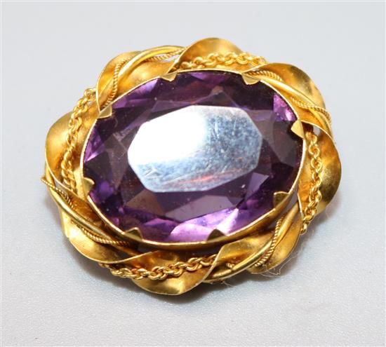 Mauve stone brooch